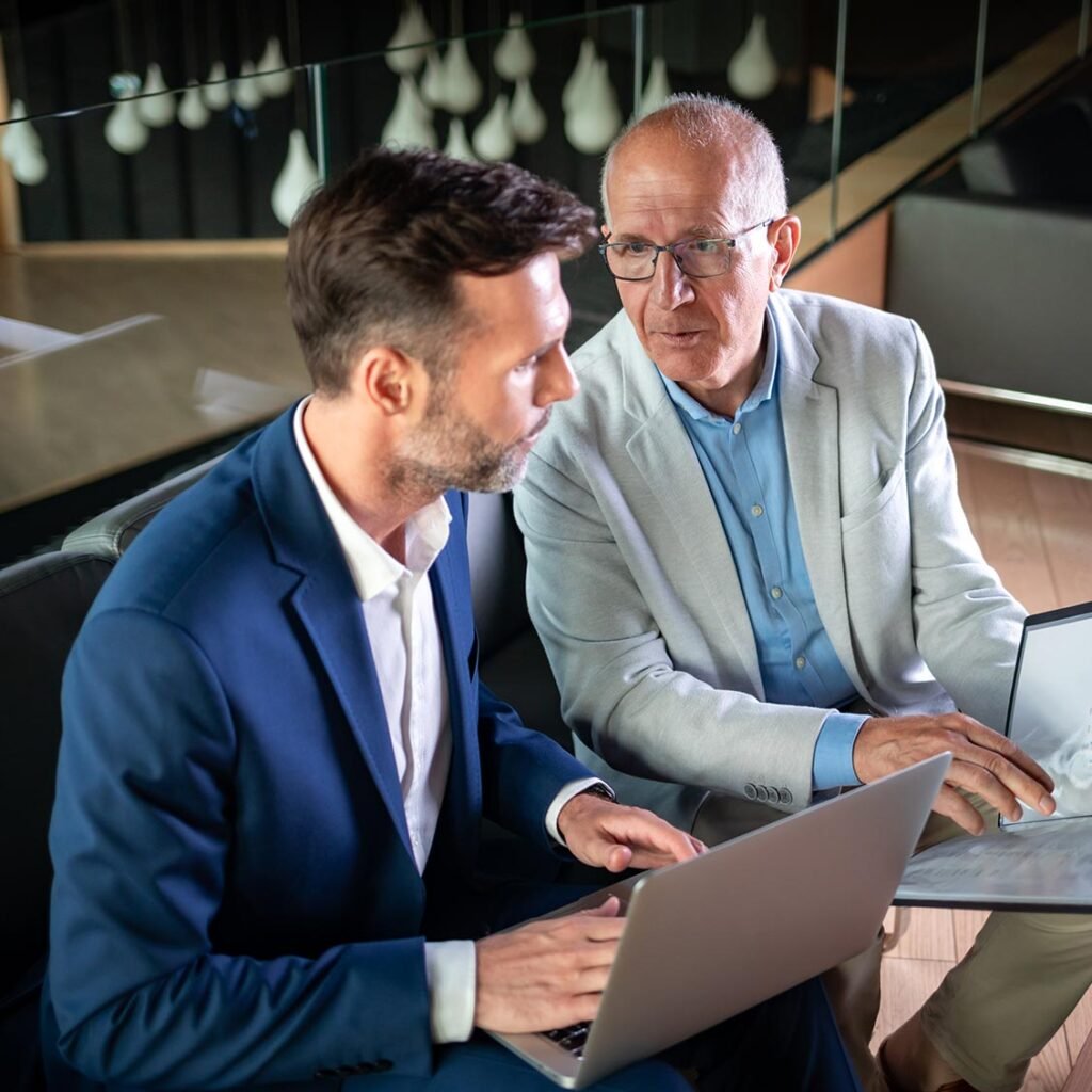 Business People Having Meeting In Modern Office In JHHWL8D 1 1024x1024