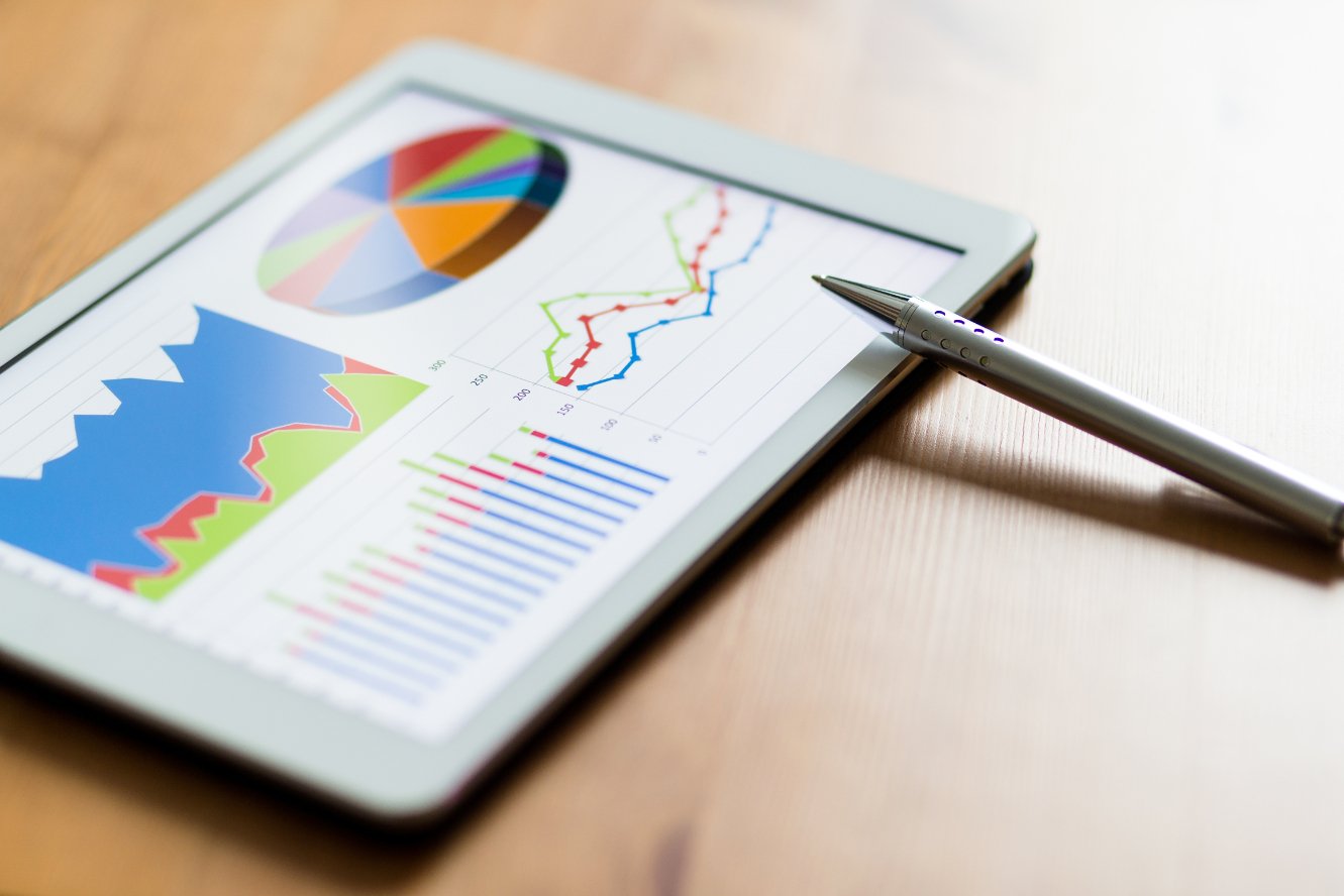 Tablet Computer And Financial Chart MTH6YBC 1